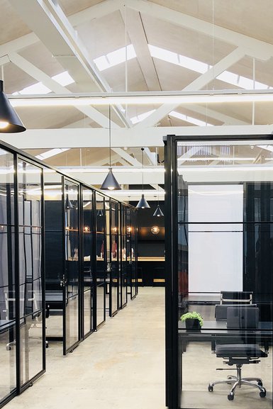 Interior of workspaces with exposed trusses contemporary fit out
